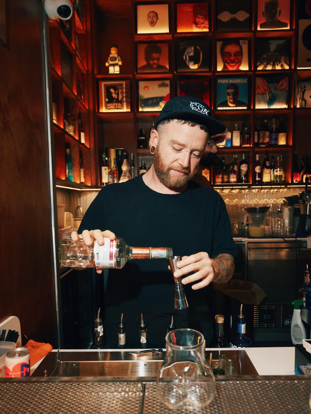 ESCO bartender pouring a drink